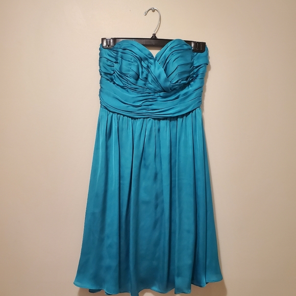 Emerald green strapless dress with a hint of blue.  Size is Small - Picture 2 of 4